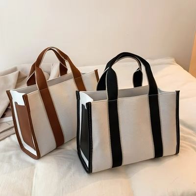 Matériau principal Sacs à main PU GHJ-31 pour femmes avec détection de mouvement et conception rayée