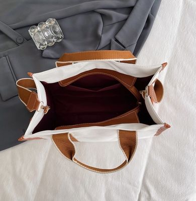 Matériau principal Sacs à main PU GHJ-31 pour femmes avec détection de mouvement et conception rayée
