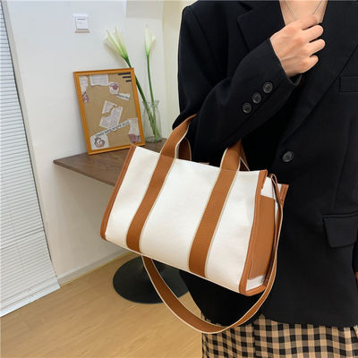 Matériau principal Sacs à main PU GHJ-31 pour femmes avec détection de mouvement et conception rayée