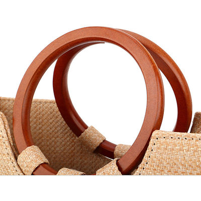 Sac de femme tissé avec une poignée d'herbe et de bois pour les loisirs