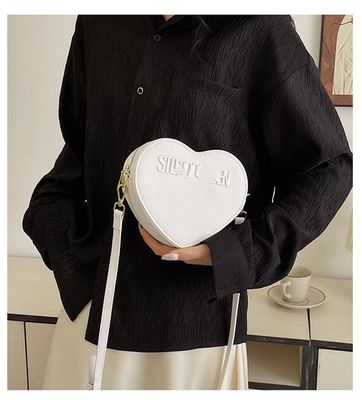 Matériau principal PU cuir à poignée unique Sacs à main pour femmes pour 2024 cadeau de la Saint-Valentin