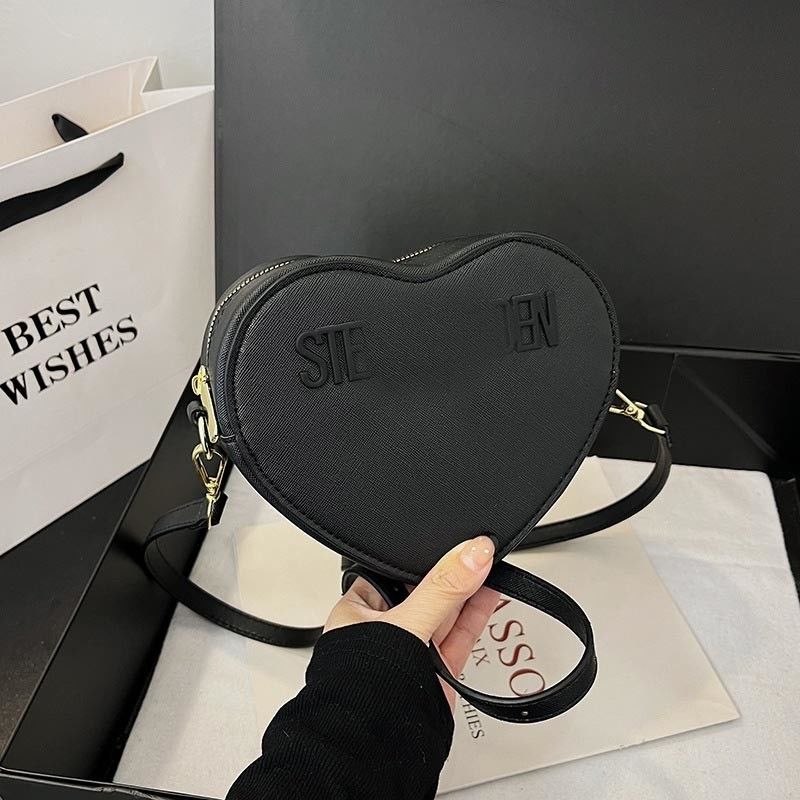 Matériau principal PU cuir à poignée unique Sacs à main pour femmes pour 2024 cadeau de la Saint-Valentin